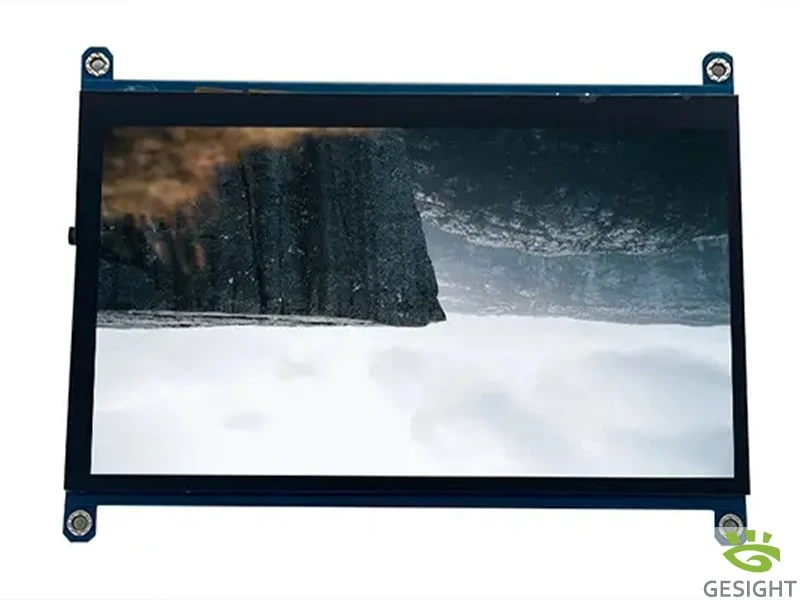 Front view of a thin 7-inch 800×480 TFT LCD module with a landscape demo image on screen.