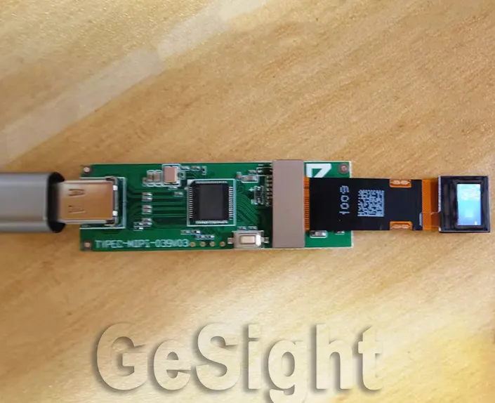 0.39-inch FHD Micro OLED module connected to a USB-C evaluation board.